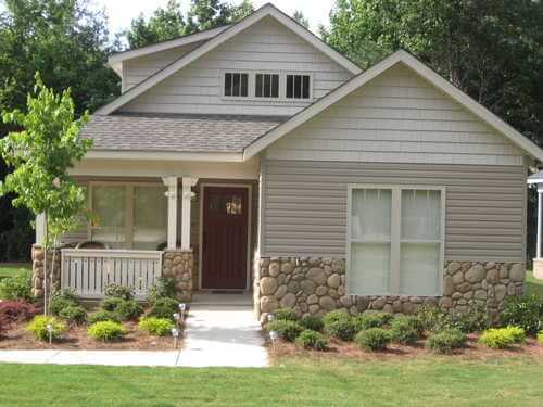 Example of zero step entrance incorporated into design - nice looking concrete walkway leads to front door