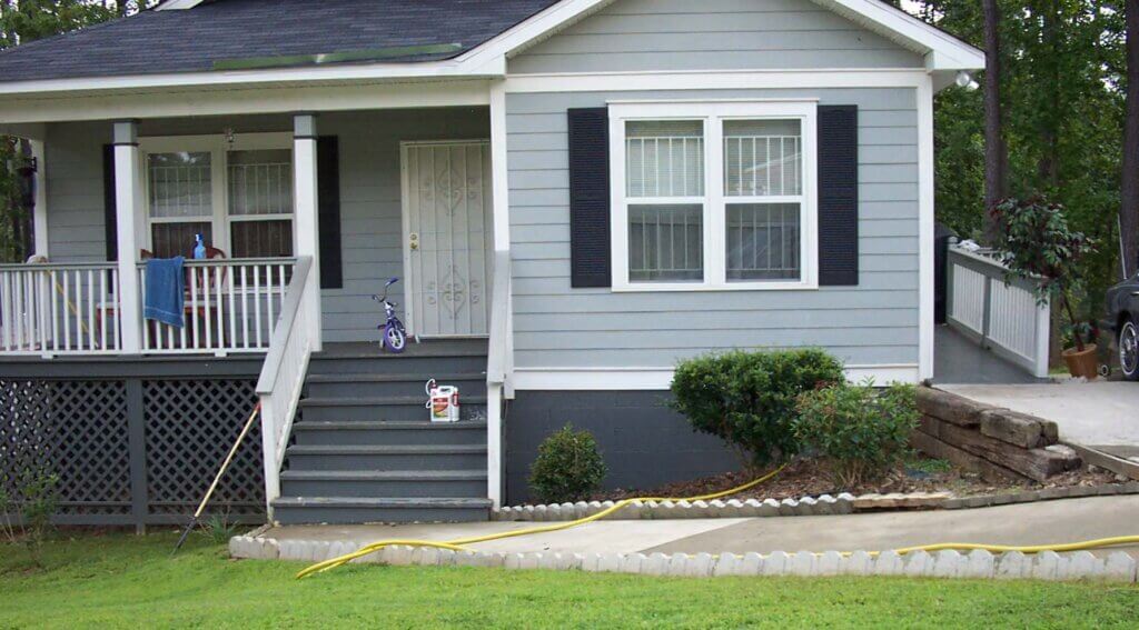 Example 2 of house built over crawl space - a ramp that is integrated with the design of the home leads to the rear entrance
