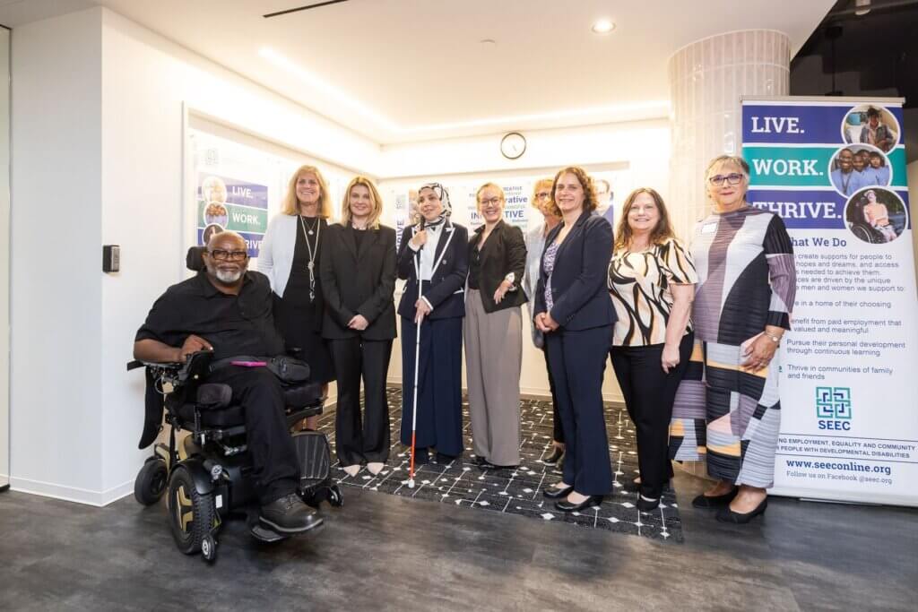 Theo Braddy and eight other people, including Ukraine’s First Lady, gather for a group photo.