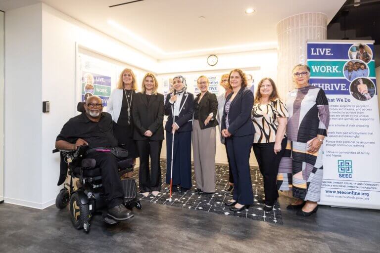 Theo Braddy and eight other people, including Ukraine’s First Lady, gather for a group photo.