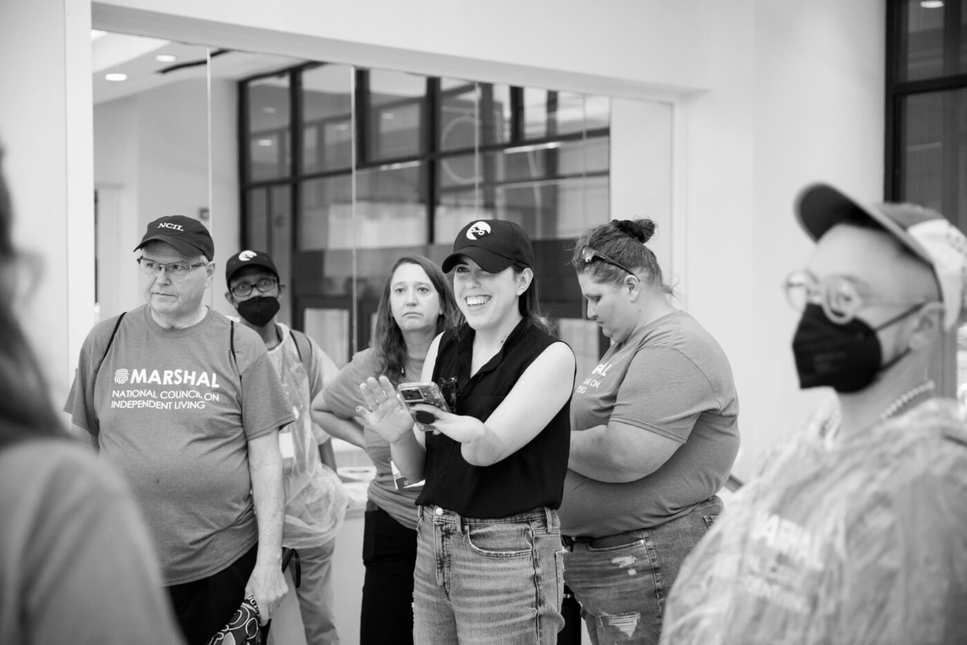 NCIL staff member Jessica Podesva organizes Marshals before the 2024 NCIL March to the Capitol