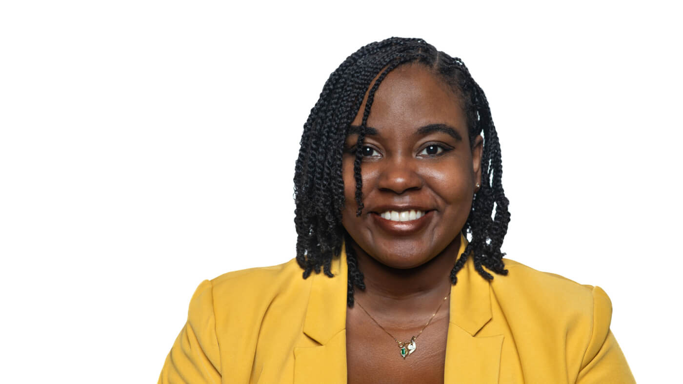 Headshot of Chandra Smith from the 2025 Conference Headshot session. Each photo shows the NCIL member from the chest up, on a stark white background.
