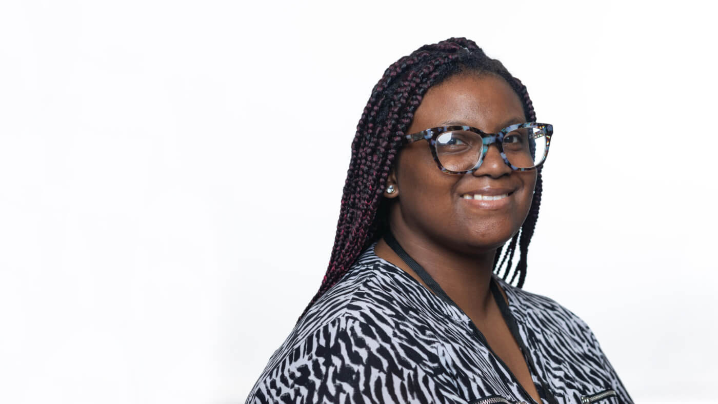 Headshot of Lauryn Huffman from the 2025 Conference Headshot session. Each photo shows the NCIL member from the chest up, on a stark white background.